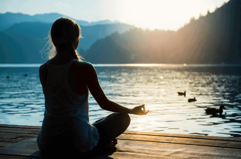 Woman meditating to Meditation with Your Younger Self to Find Your Genius